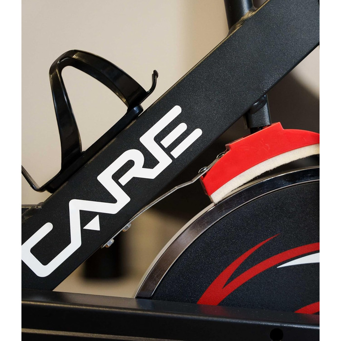 CARE FITNESS Велотренажер для дому - Spike 74450 з маховиком 12 кг, педалі з зачепом, триатлонний кермо та ролики для пересування
