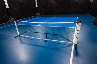 Onix Pickleball 2-в-1 портативна сітка та тренувальний набір, з сумкою на колесах, біла
